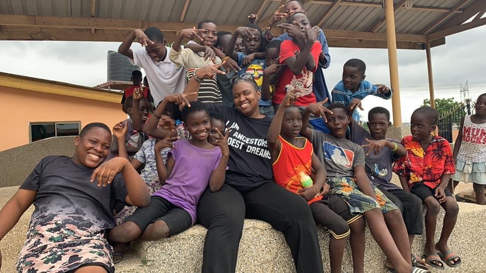 Naa Odey Tene Parks with kids from her community in Odumase.